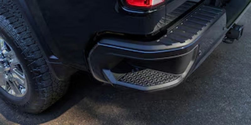 2026 Chevrolet Silverado 2500HD rear bumper with corner step and trailer hitch